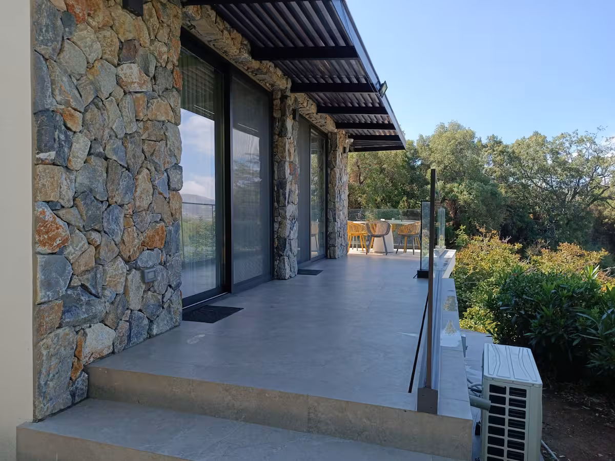Stone veranda opening onto the garden